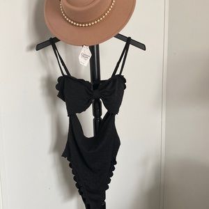 Detailed black swimsuit.